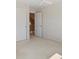 This bedroom features two closets and an open door frame at 6449 S Jamaica Cir, Englewood, CO 80111