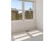 The bedroom has a bright window that provides lots of natural light at 6449 S Jamaica Cir, Englewood, CO 80111