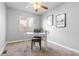 Well-lit office space with a desk, chair, and neutral decor for a productive workspace at 22815 E Progress Ave, Aurora, CO 80015