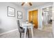 Bright office featuring a desk, chair, and closet space for storage at 22815 E Progress Ave, Aurora, CO 80015