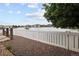 Gorgeous backyard with a tranquil lake view and lush landscaping at 15555 E 40Th Ave # 36, Denver, CO 80239