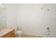 Clean bathroom includes a bath/shower combo, toilet, and vanity with storage at 15555 E 40Th Ave # 36, Denver, CO 80239