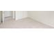 Bedroom featuring neutral carpet and a double-door closet for maximum storage at 15555 E 40Th Ave # 36, Denver, CO 80239