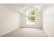 Spacious bedroom features large windows offering lots of natural light at 15555 E 40Th Ave # 36, Denver, CO 80239