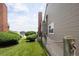 Charming home featuring a walkway with rope details, neat landscaping, and scenic water view at 15555 E 40Th Ave # 36, Denver, CO 80239