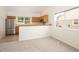 Bright and open living room offers lots of light and an open kitchen area at 15555 E 40Th Ave # 36, Denver, CO 80239