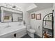Quaint bathroom featuring vintage sink with black and white accents at 3303 Wolfensberger Rd, Sedalia, CO 80135