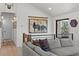 Bright living room features unique decor and furnishings as well as views from the elevated vantage point at 3303 Wolfensberger Rd, Sedalia, CO 80135