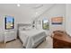 Bright main bedroom with vaulted ceilings and an abundance of natural light at 3303 Wolfensberger Rd, Sedalia, CO 80135