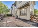 Cozy back yard area with a stone border and patio area for outdoor enjoyment at 13025 Grant Cir # A, Thornton, CO 80241