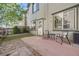 A patio area in the backyard offers space for outdoor seating and relaxation at 13025 Grant Cir # A, Thornton, CO 80241