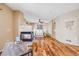 Spacious main bedroom boasts a fireplace, ceiling fan, ensuite bathroom and hardwood floors at 13025 Grant Cir # A, Thornton, CO 80241