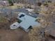 Aerial view of a well-maintained home with solar panels and a landscaped yard at 3923 S Idalia St, Aurora, CO 80013