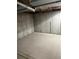 Unfinished basement showcasing concrete walls and floors with carpet at 3923 S Idalia St, Aurora, CO 80013