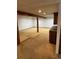 Large basement space, perfect for entertaining, featuring a wet bar at 3923 S Idalia St, Aurora, CO 80013