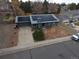 Charming one-story green home equipped with energy-efficient solar panels on a well-maintained lawn at 3923 S Idalia St, Aurora, CO 80013