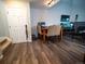 Bright entryway with a dining area and laminate flooring at 11105 E Alameda Ave # 202, Aurora, CO 80012