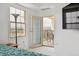 Bedroom view with balcony access, showcasing city views at 300 W 11Th Ave # 15C, Denver, CO 80204