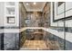 Luxurious bathroom featuring a modern glass enclosed shower with designer tile at 300 W 11Th Ave # 15C, Denver, CO 80204
