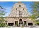 Elegant high-rise building featuring an impressive entrance and beautiful architectural details under a clear blue sky at 300 W 11Th Ave # 15C, Denver, CO 80204