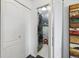 Laundry closet with stacked washer and dryer units at 300 W 11Th Ave # 15C, Denver, CO 80204