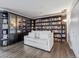 Inviting living room with built-in bookshelves and a comfortable sofa at 300 W 11Th Ave # 15C, Denver, CO 80204