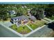 Aerial view of modern home with outdoor patio and landscaped front yard in a residential neighborhood at 2900 S Adams St, Denver, CO 80210