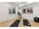 Home gym features exercise mats, free weights, and natural light from a large window at 2900 S Adams St, Denver, CO 80210