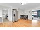 View of the dining area and kitchen featuring stainless steel appliances, and easy access to the laundry room at 4680 Independence St, Wheat Ridge, CO 80033
