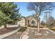Beautiful landscaped yard with walkway leading to the front door of the home at 3174 Soaring Eagle Ln, Castle Rock, CO 80109