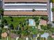 Overhead view of townhomes with community pool, grassy areas, and covered parking spots at 12993 W 20Th Ave, Golden, CO 80401