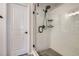 Elegant glass-enclosed shower featuring modern fixtures and tiled walls, providing a luxurious feel at 21038 E Quincy Pl, Aurora, CO 80015