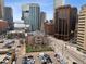 Downtown aerial view features a church and parking at 2001 Lincoln St # 920, Denver, CO 80202