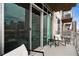Outdoor balcony with seating and cityscape views at 2001 Lincoln St # 920, Denver, CO 80202
