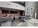 Entertaining area with bar and kitchen in community room, with seating and modern decor at 2001 Lincoln St # 920, Denver, CO 80202
