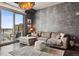 Elegant living room showcases city views, a comfortable sofa, and stylish décor for upscale living at 2001 Lincoln St # 920, Denver, CO 80202