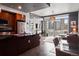 Open-concept living space with kitchen island, city views, and a comfortable seating area for modern living at 2001 Lincoln St # 920, Denver, CO 80202
