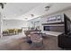 Spacious lounge area with TV, fireplace and comfortable seating at 2001 Lincoln St # 920, Denver, CO 80202