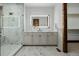 Elegant bathroom with a sleek vanity, marble accents, and a glass-enclosed shower at 1332 S Lafayette St, Denver, CO 80210