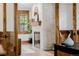 Living room featuring fireplace, hardwood floors, and natural light at 1332 S Lafayette St, Denver, CO 80210