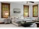 Comfortable main bedroom with natural light, stylish furnishings, and an inviting ambiance at 1332 S Lafayette St, Denver, CO 80210