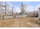 Fenced backyard with a large open area at 3736 S Lincoln St, Englewood, CO 80113