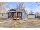 Updated bungalow with a detached garage and landscaped yard at 3736 S Lincoln St, Englewood, CO 80113