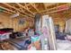 Unfinished garage with high ceilings and ample storage at 3736 S Lincoln St, Englewood, CO 80113