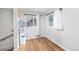 Small hallway with a water cooler and wood-look flooring at 3736 S Lincoln St, Englewood, CO 80113