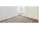 Small bedroom with carpet flooring and neutral walls at 1546 Farmstead St, Brighton, CO 80601