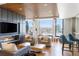 Relaxing resident lounge featuring comfortable seating, a fireplace, city views, and modern decor at 1750 Wewatta St # 809, Denver, CO 80202