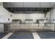 Modern outdoor kitchen with stainless steel grills, ample counter space, and cooking ventilation at 1750 Wewatta St # 809, Denver, CO 80202