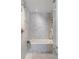 Tiled shower and tub offer a clean and modern spa-like experience with elegant fixtures at 1750 Wewatta St # 809, Denver, CO 80202