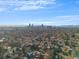 Neighborhood view with cityscape and mountain backdrop at 2207 E 25Th, Denver, CO 80205